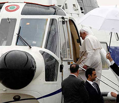 Pope entering his helicopter for flight from Vatican to Castel Gondolfo.